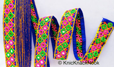 Blue Cotton Fabric Mirrored Trim With Embroidery In Fuchsia Pink, Green, Red & Yellow Threads